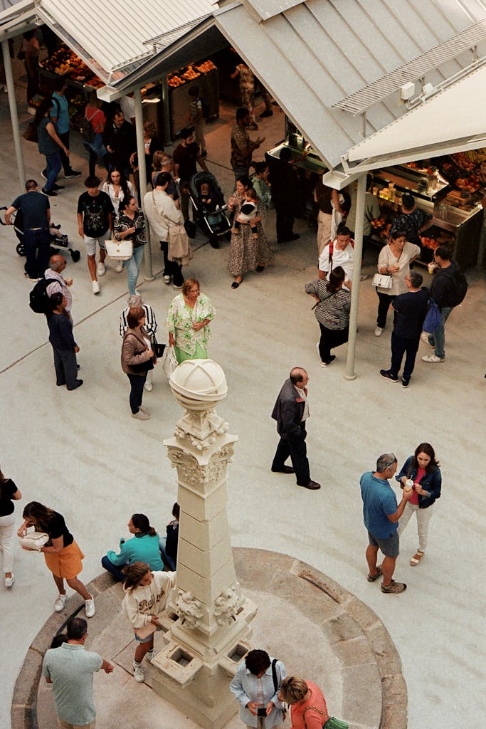 A bustling scene at Mercado do Bolhão in Porto, showcasing daily life and commerce.