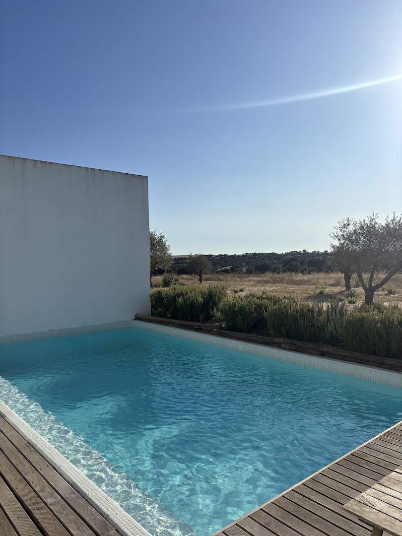 Private villa pool and wooden deck overlooking the countryside at Octant Évora