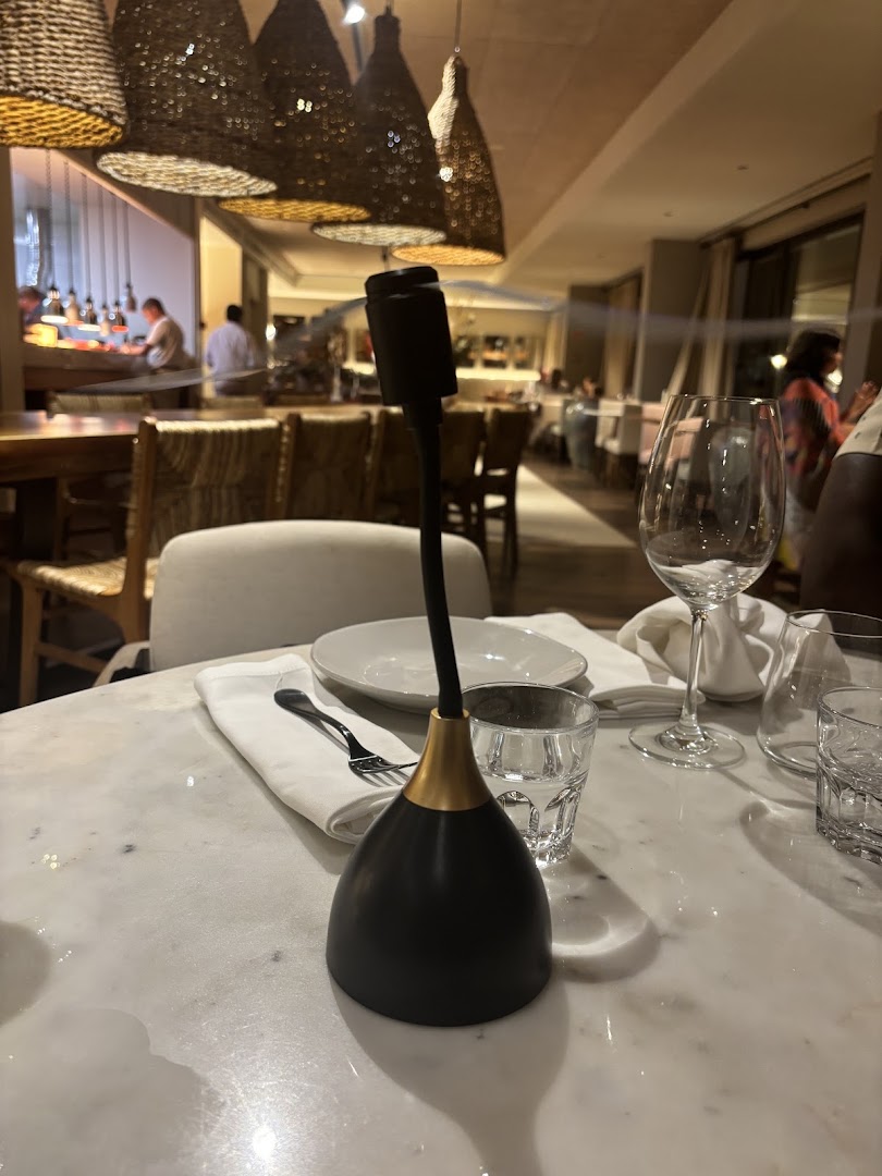 Small table fan beside our place settings at À Terra restaurant
