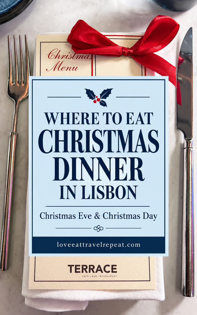 Christmas dinner table setting in Lisbon with menu, red ribbon bow, fork and knife on white napkin at Terrace restaurant.