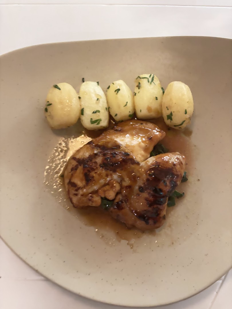Plated dinner with sauce and potato accompaniments at Vila Vita Parc.